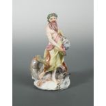 A Bow figure of Neptune, circa 1755, modelled standing holding a jar issuing water with a dolphin by