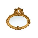 A 19th century Italian gilt framed mirror, with cherubs and scroll cresting 107 x 117cm (42 x 46in)