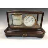 An Edwardian mahogany cased barograph, with glazed cover, lacquered brass mechanism, a drawer to the