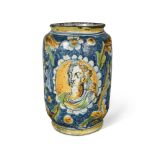 A large Venetian maiolica albarello, late 16th century, painted to each side with oval panels of a