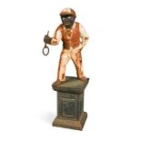An American cast iron and cold painted 'Lawn Jockey' 97cm (38in)