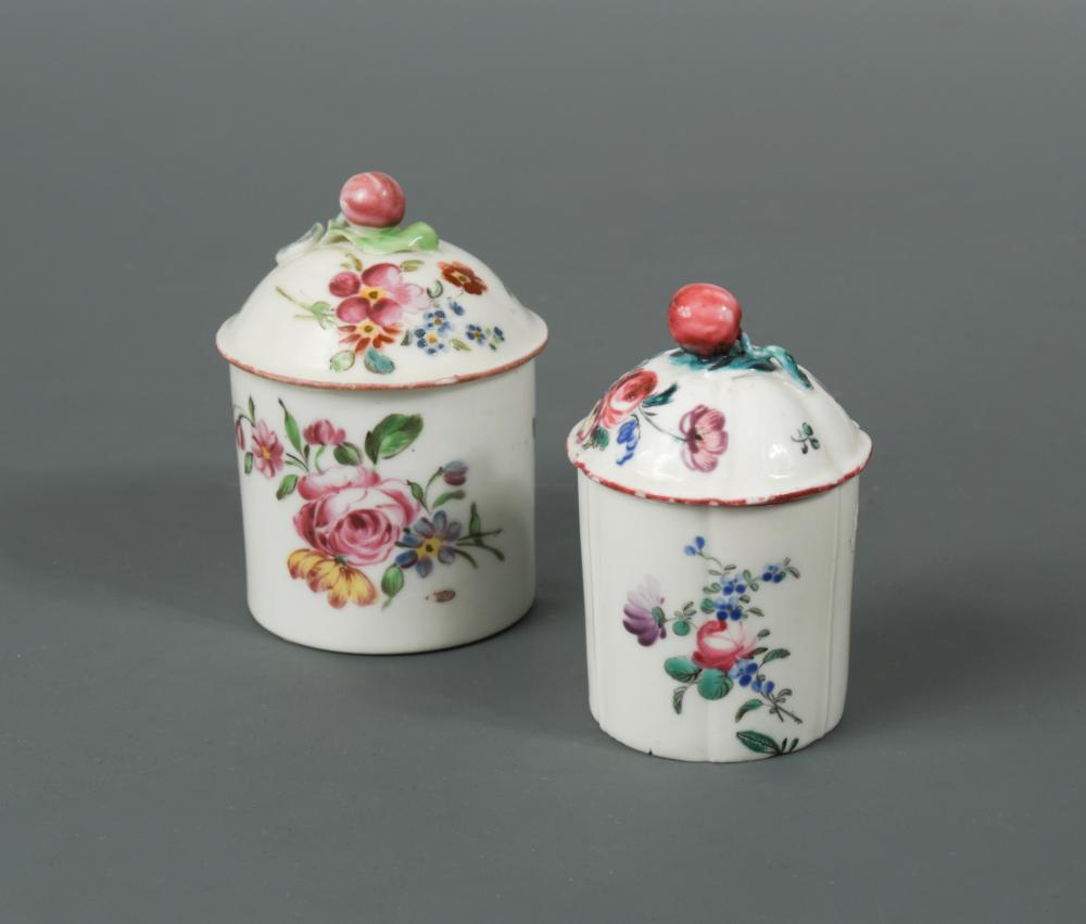 A Mennecy toilet pot and cover, circa 1760, painted with scattered flowers, the cover with bud