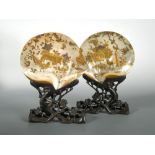 A pair of Chinese mother of pearl export oyster shells on stands, Canton, Qing Dynasty, mid 19th