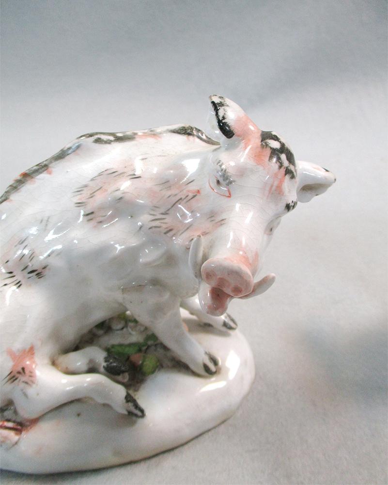 A pair of porcelain models of 'Florentine' boars, on oval bases encrusted with foliage, 14cm long ( - Image 2 of 5