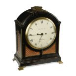 A Regency ebonised bracket clock, the single pad top case with carrying handle above 8inch (20cm)