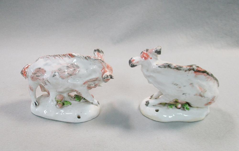 A pair of porcelain models of 'Florentine' boars, on oval bases encrusted with foliage, 14cm long ( - Image 4 of 5