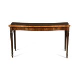 A George III mahogany serpentine serving table, with a plain frieze and moulded border, on reeded