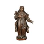 A 17th century German limewood carving of a saintly figure, in flowing robes 90cm (35in)