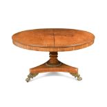 A Regency mahogany centre table, in the manner of Gillow, the circular crossbanded top, on turned