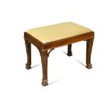 An Edwardian mahogany stool, on tapering square carved legs 46 x 62cm (18 x 24in)