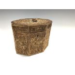 A George III rolled paper tea caddy, of lozenge form, decorated with foliate motifs within