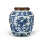 A Chinese blue and white large ovoid vase, Wanli (1572-1620), painted with flowering shrubs