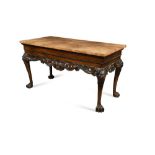 An Irish George III mahogany rectangular side table, with a simulated marble top, the plain frieze