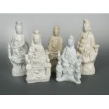 A group of five Chinese Dehua Guanyin figure groups, Qing Dynasty, each goddess with between one and