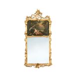 A 20th century George III style gilt framed trumeau mirror, painted with figures in a landscape