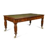 A William IV mahogany library table, fitted six drawers, on octagonal tapering legs and large
