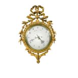 An early 19th century Austrian giltwood wall clock, signed 'Gassner in Wien', the 25cm white dial