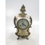 A 19th century gilt mounted French porcelain mantel clock