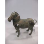 A Tang style bronzed composition model of a horse, modern