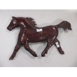 A modern carved stained pine model of a horse