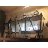 A set of four brass framed hall lanterns (4)