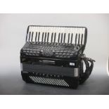 A Bugari Champion Cass accordion, castelfidardo armando, with original case