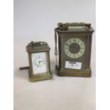 A brass carriage timepiece and another miniature example (2)