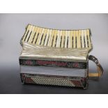 A Scandalli "Scott Wood Four" accordion, cased