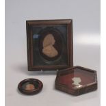 Two wax portraits and a carved classical profile (framed) (3)