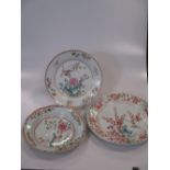A pair of 18th century famille rose plates, decorated in the Kakiemon manner (rim chips); with two