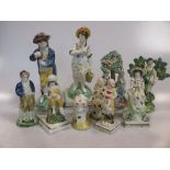 A group of 18th century Walton and prattware type figures, to include a dog, figure of Autumn and