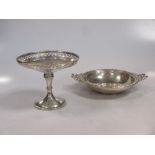 A silver shallow bowl, early 20th century, ribbon handles, London hallmarked; and a silver