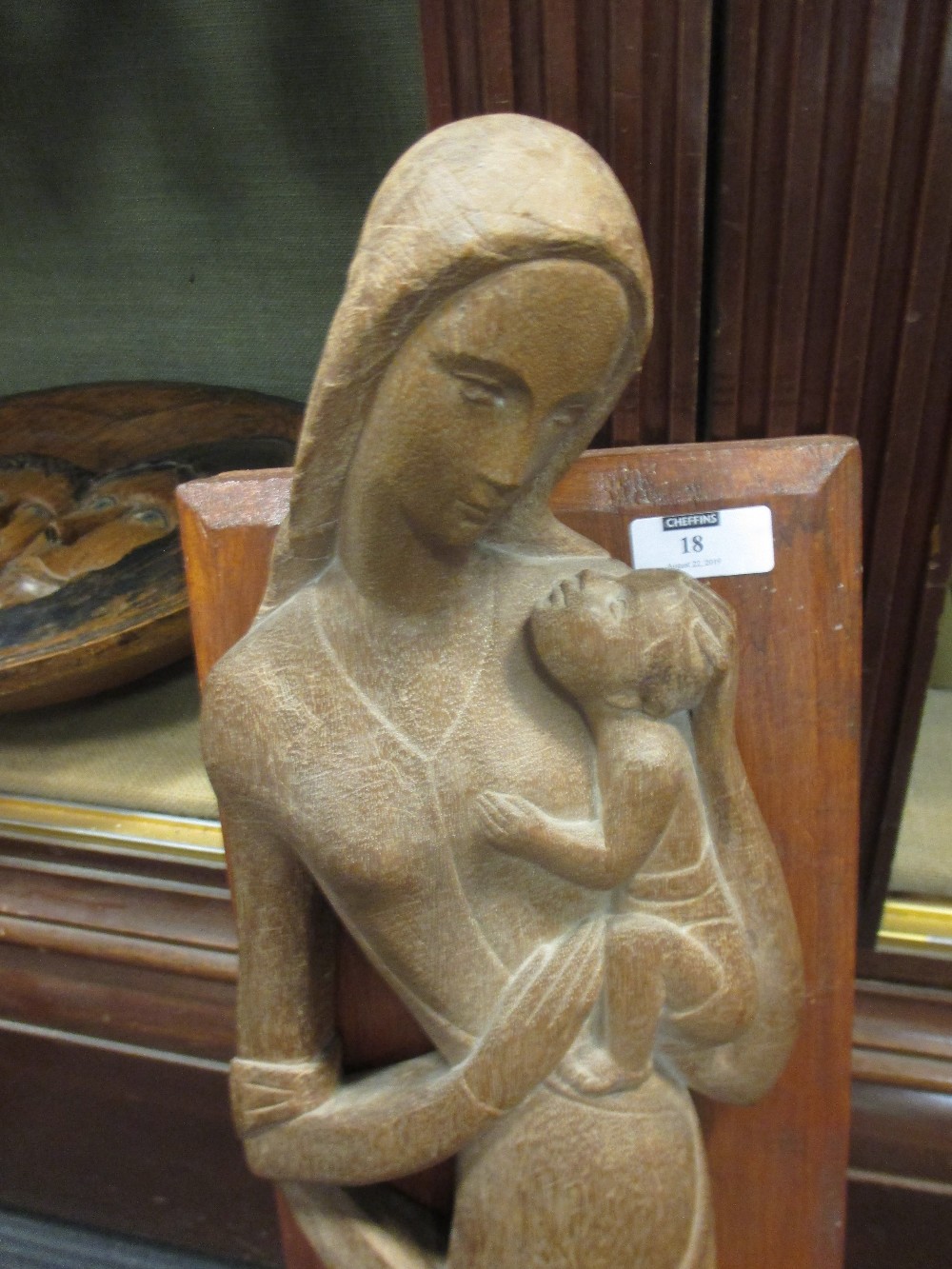 A carved oak figure of Madonna and child in flattened perspective, signed 'Demetz Eugen' and dated - Bild 2 aus 2