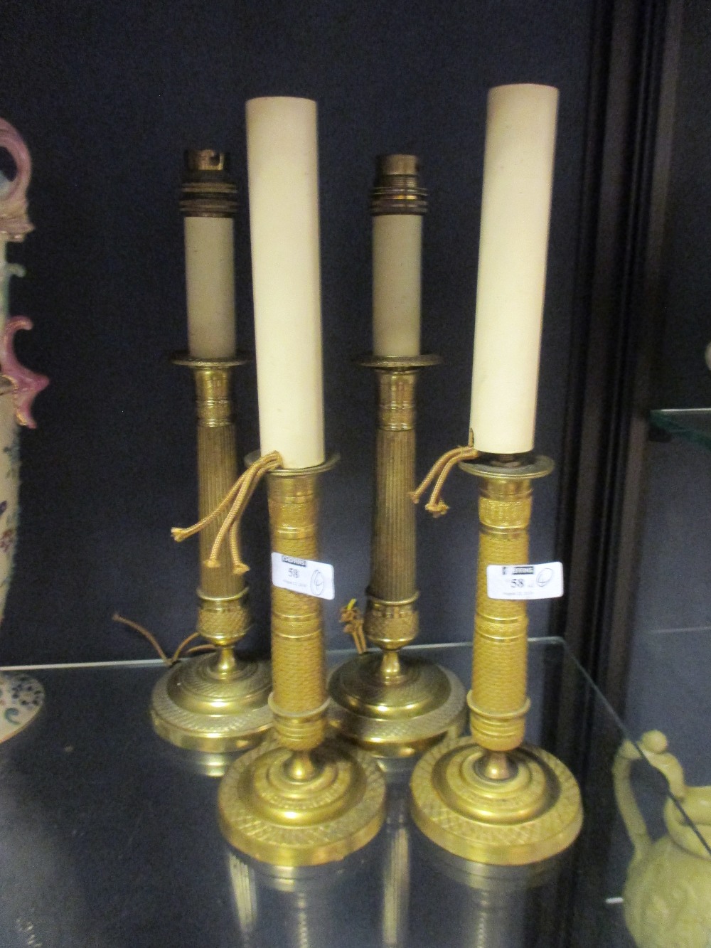 Two matched pairs of Empire candlesticks - for electricity (4)