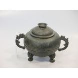 A 19th century Chinese bronze archaic style censor and cover