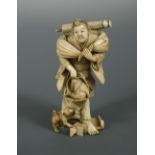 An ivory okimono of a man with a fish basket, Meiji period, finely carved, the figure carrying on