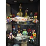 A collection of Murano glass clowns and a fish