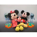 A box of Mickey Mouse items including phones etc