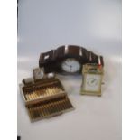 A walnut mantel clock, 1922, a brass carriage clock and a cigarette box clock