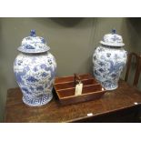 A pair of modern Chinese blue & white vases and covers (2)