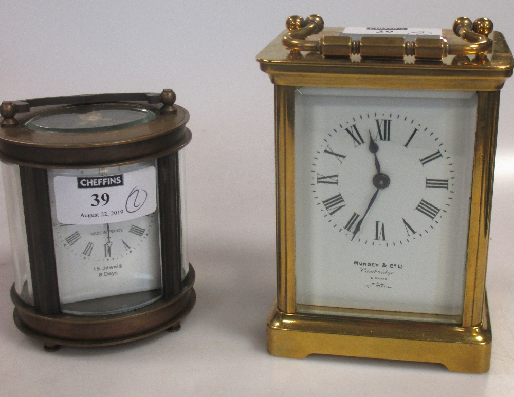 A carriage clock retailed by Munsey, together with a Boudois carriage clock (2)