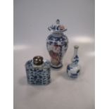 A Chinese blue and white double gourd vase, Kangzi (1662-1722), painted with precious objects and