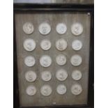 A large 20th century set of framed plaster medallions 115cm x 148cm