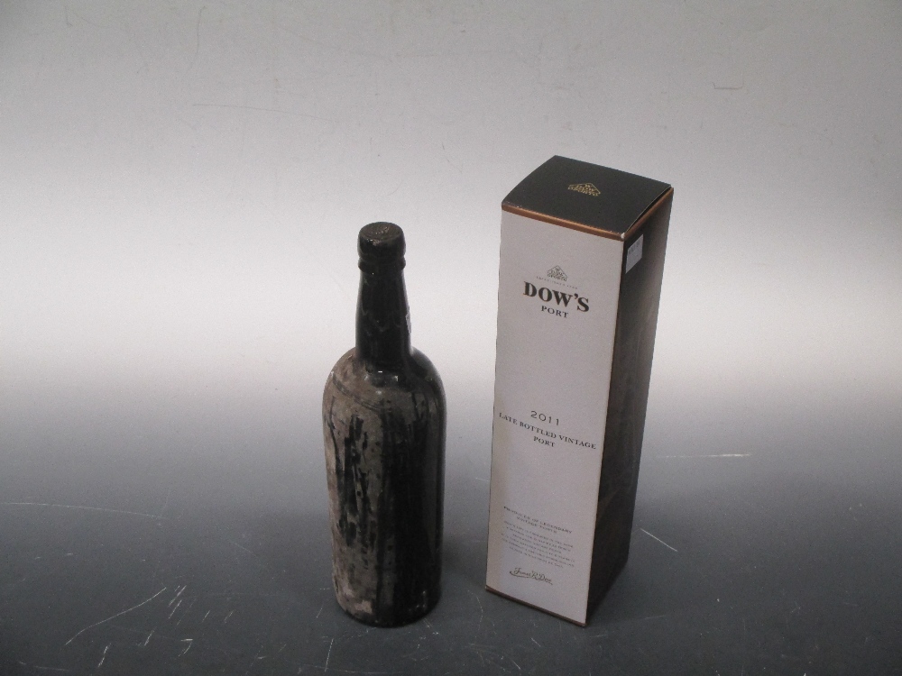 A mid 20th century bottle of port and a Dows 2011 bottle of port (2)