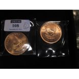 Two full Krugerrand coins