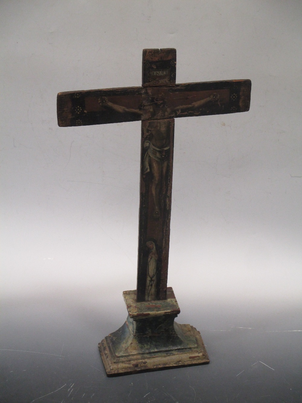 An Italian painted crucifix, 58cm high