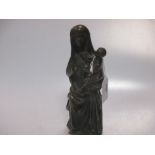 A bronze figure of the Madonna and child, 19th century or earlier, 20.5cm high,