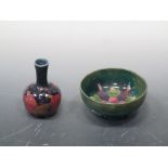 A miniature Moorcroft 'pomegranate' pattern vase, 9cm high; a Moorcroft small bowl, 10.5cm