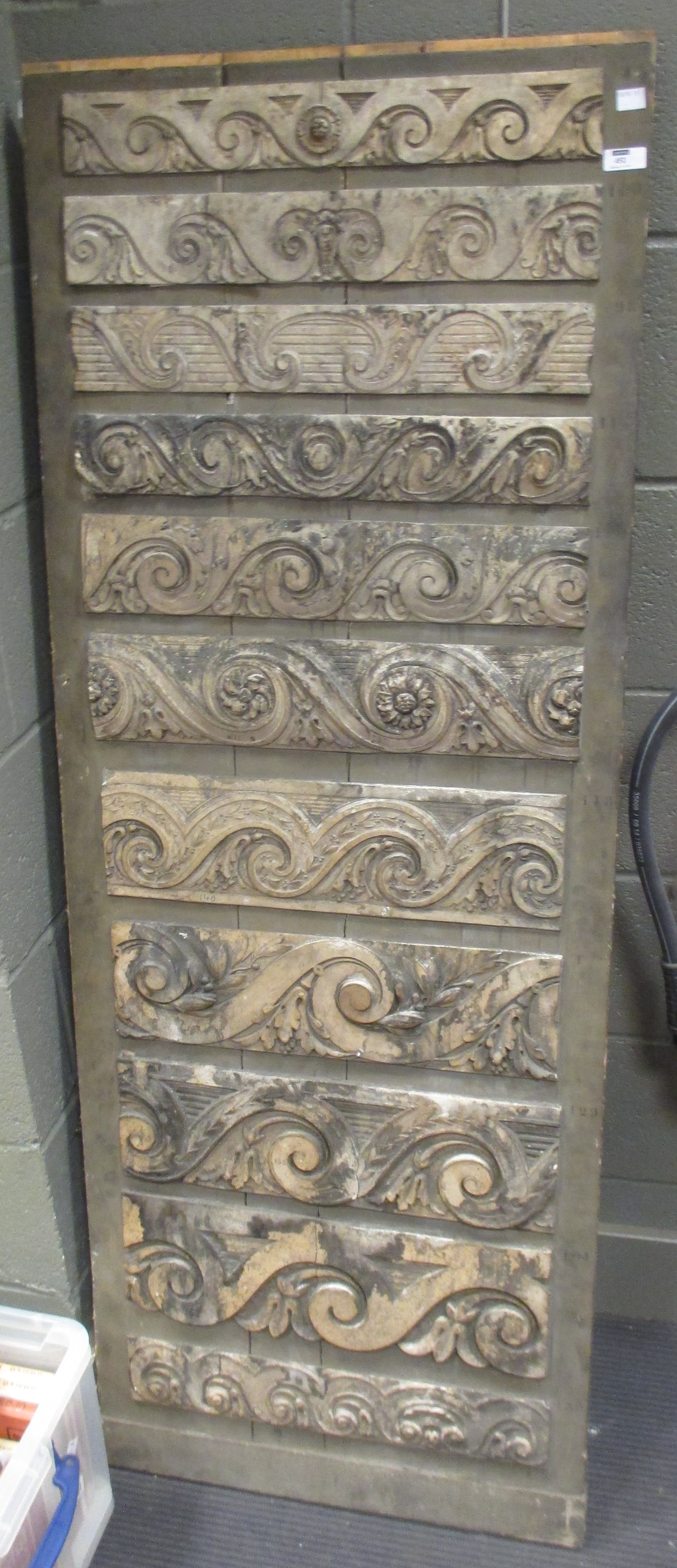 A 19th century Danish Architectural two sided sample plaster moulding board 58cm x 156cm high