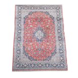 A Tabriz madder ground carpet, 440 x 290 cm